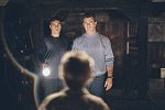 Mel Gibson, Joaquin Phoenix and Rory Culkin in "Signs"